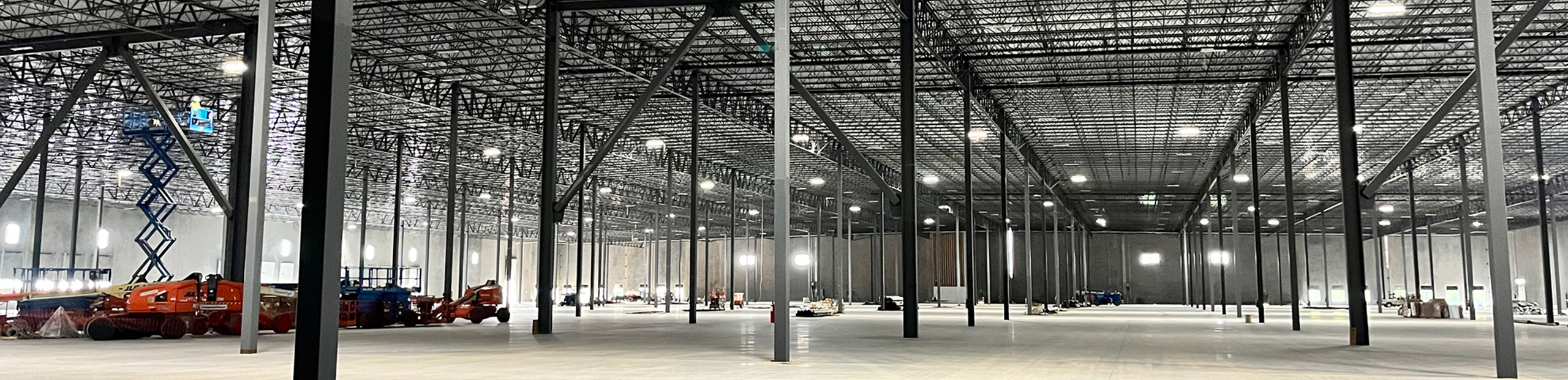 CVP-Development-Homepage-2560x621 Interior of a warehouse being built